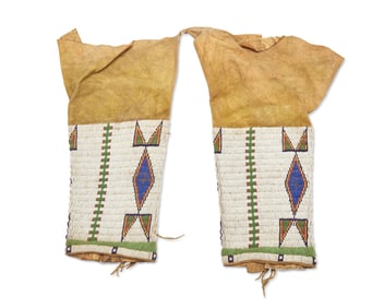 A pair of Sioux beaded hide leggings