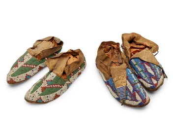 Two pairs of Native American beaded hide moccasins