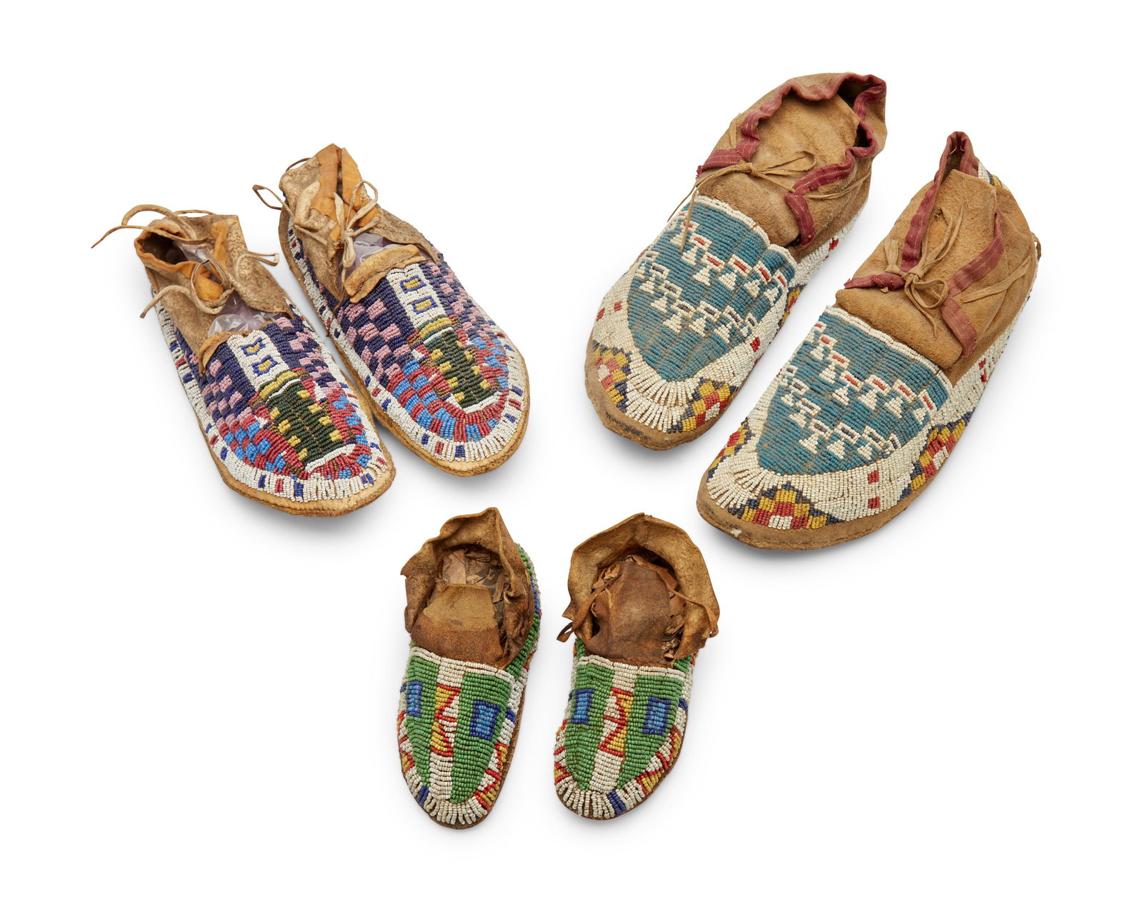 Three pairs of Native American beaded hide moccasins (1 of 5)