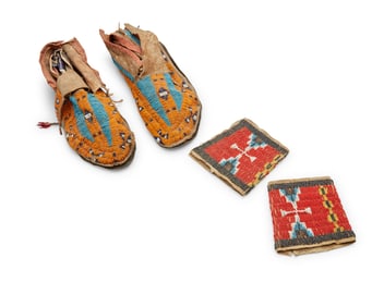 A group of Native American beaded hide articles