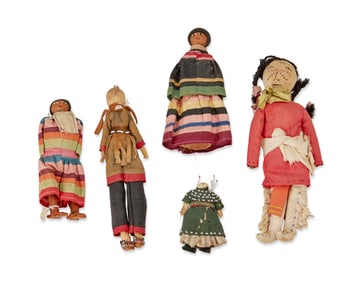 A group of Native American dolls