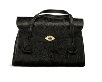 A vintage Western tooled black leather handbag