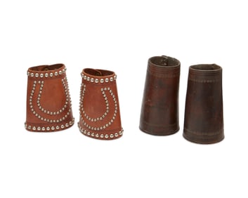 Two pairs of cowboy equestrian leather cuffs