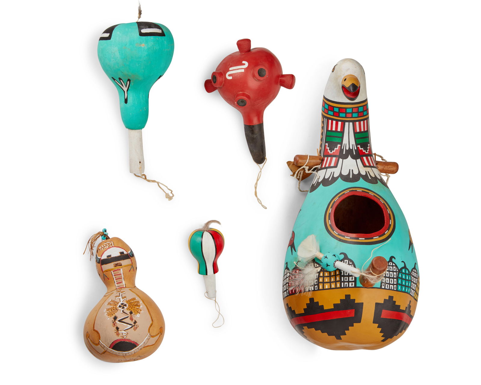 A Hopi polychrome gourd bird feeder and four rattles (1 of 5)