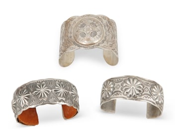 Three Southwest silver stamped cuff bracelets