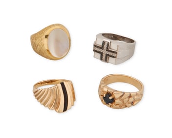A Group of Four Gold and Gem-Set Rings
