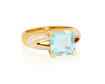 An 18K Gold, Aquamarine and Diamond Ring