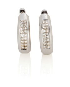 A Pair of White Gold and Diamond Earrings