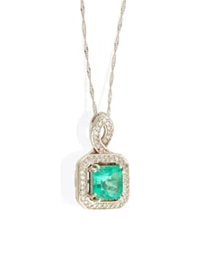 A White Gold, Emerald and Diamond Pendant Necklace