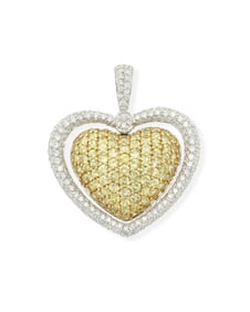A yellow sapphire and diamond heart pendant