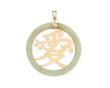 A 14K Gold and Jade Pendant
