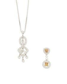 A White Gold and Diamond Necklace and Pendant