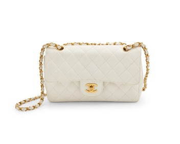 CHANEL: A Vintage White Caviar Leather Small Classic Double Flap Bag