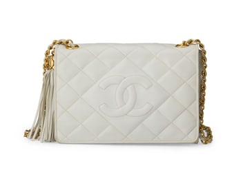 CHANEL: A Vintage CC White Matelasse Leather Front Flap Shoulder Bag