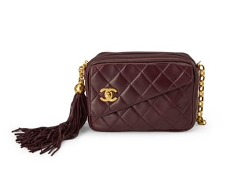 CHANEL: A Vintage Purple Matelasse Leather Angle Pocket Camera Bag