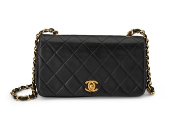 CHANEL: A Vintage Black Matelasse Leather Single Flap Small Shoulder Bag