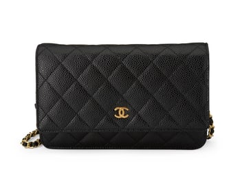 CHANEL: A Black Caviar Leather CC Classic Quilted Wallet on Chain