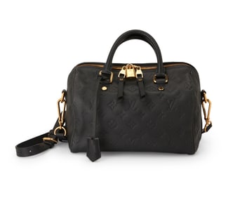 Louis Vuitton: A Monogram Dark Navy Empreinte Leather Speedy Bandouliere 25 Bag