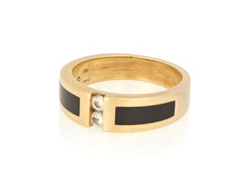 An 18K Gold, Onyx and Diamond Ring