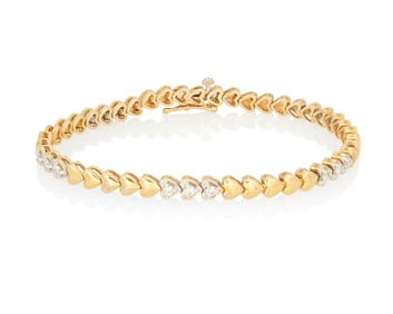 A 14K Gold and Diamond Bracelet