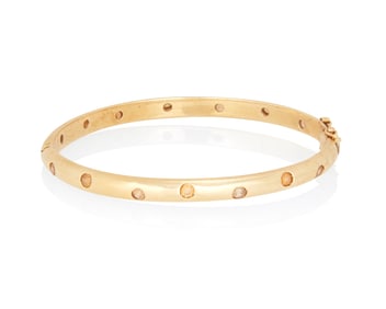 A 14K Gold and Topaz Bangle
