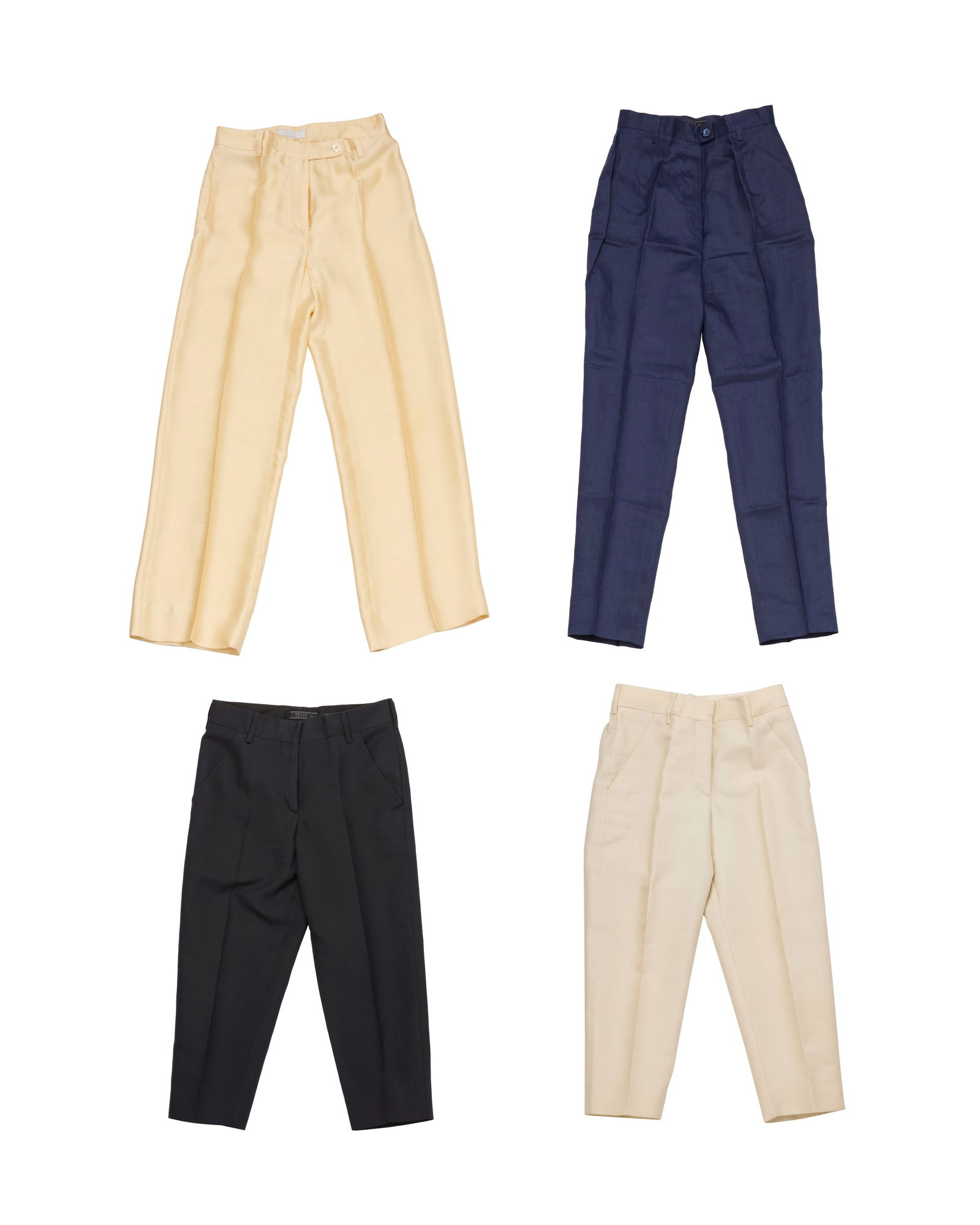 Prada: A Group of Ladies' Pants: Prada: A Group of Ladies' PantsCirca 1990s-2000sLabels: Prada / Milano / Made in ItalyComprising four pairs of pants/trousers in various fabrics, lengths, and colors including cream silk, navy ramie o