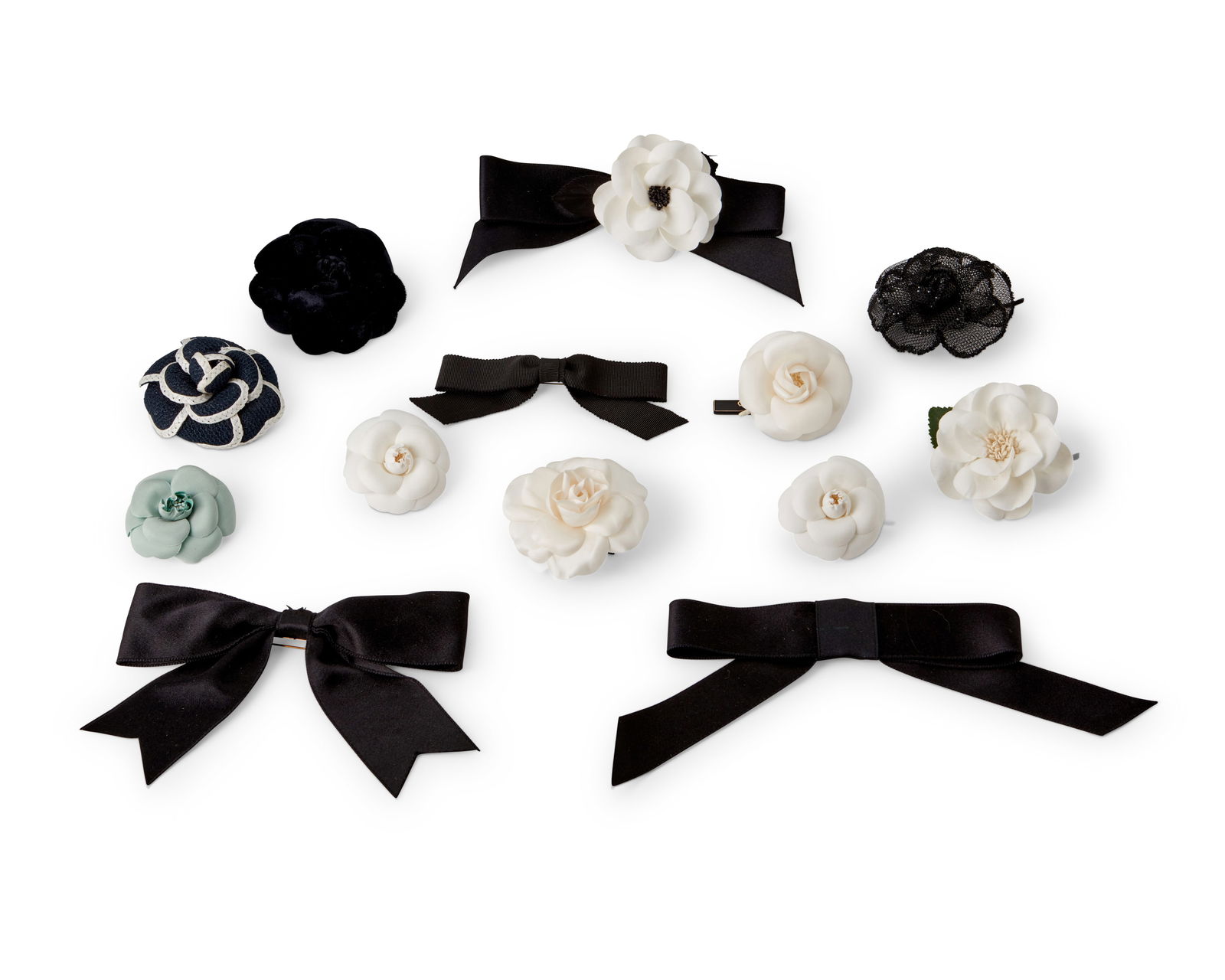 CHANEL: A Group of Vintage Floral Brooches and Hair Ornaments (1 of 2)