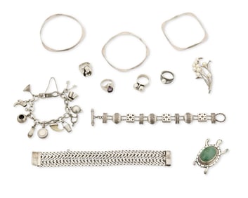 A group of silver jewelry