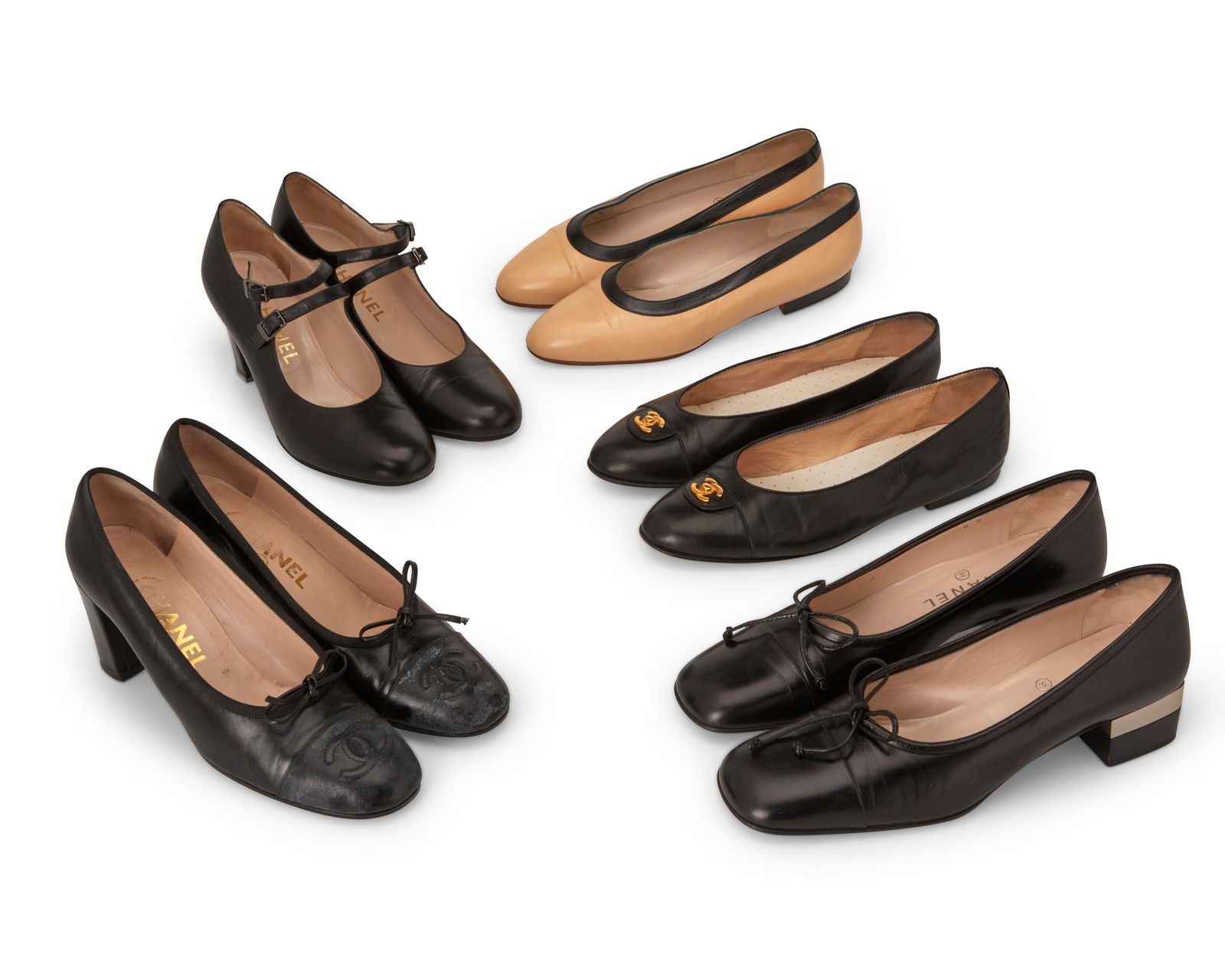 CHANEL: A Group of Vintage Leather Shoes: CHANEL: A Group of Vintage Leather ShoesCirca 1990s-2000sEach variously marked: Chanel / Italy / FranceComprising five pairs in various colors of leather and styles including a tan and black leather p