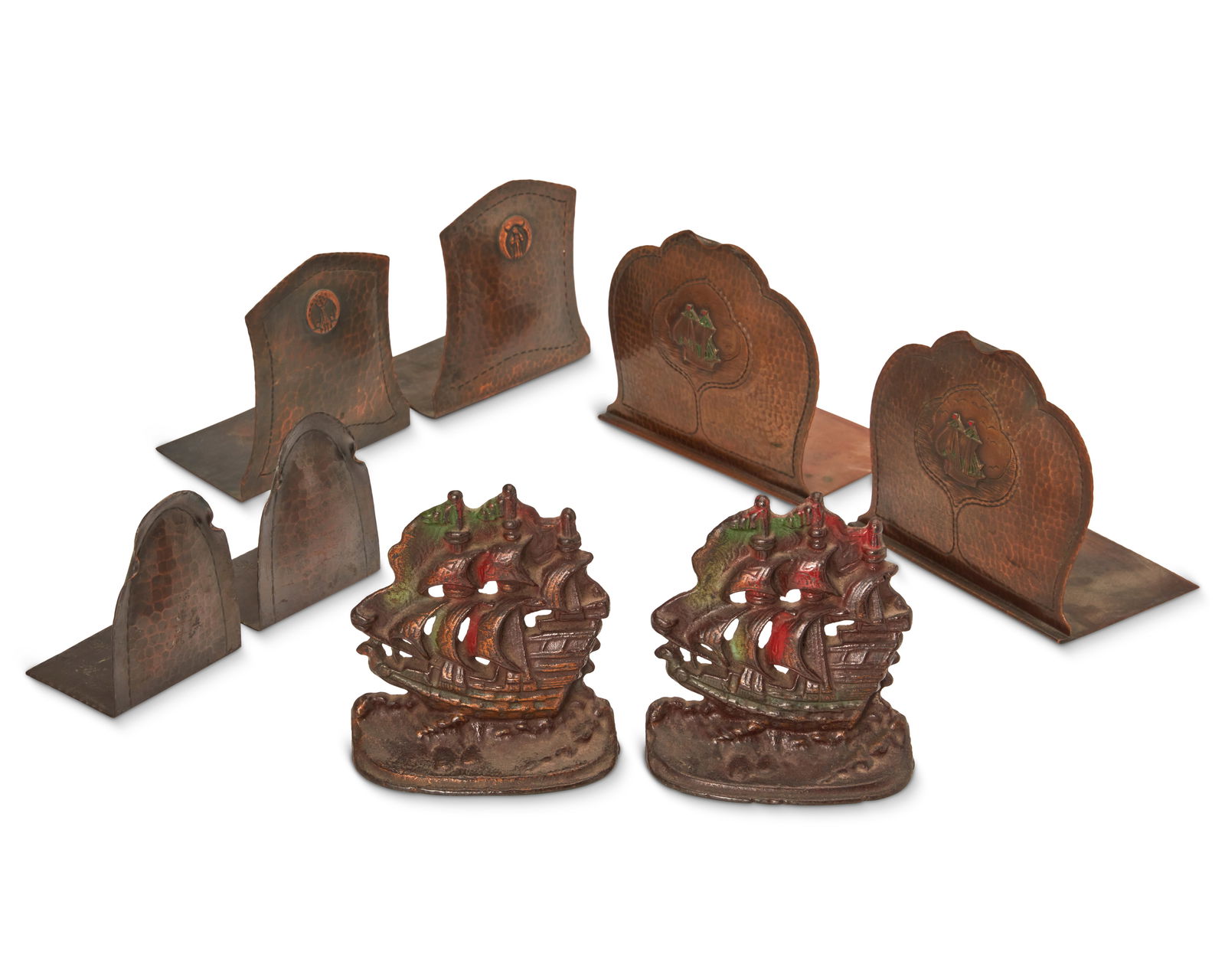Four pairs of Arts & Crafts metal bookends (1 of 5)