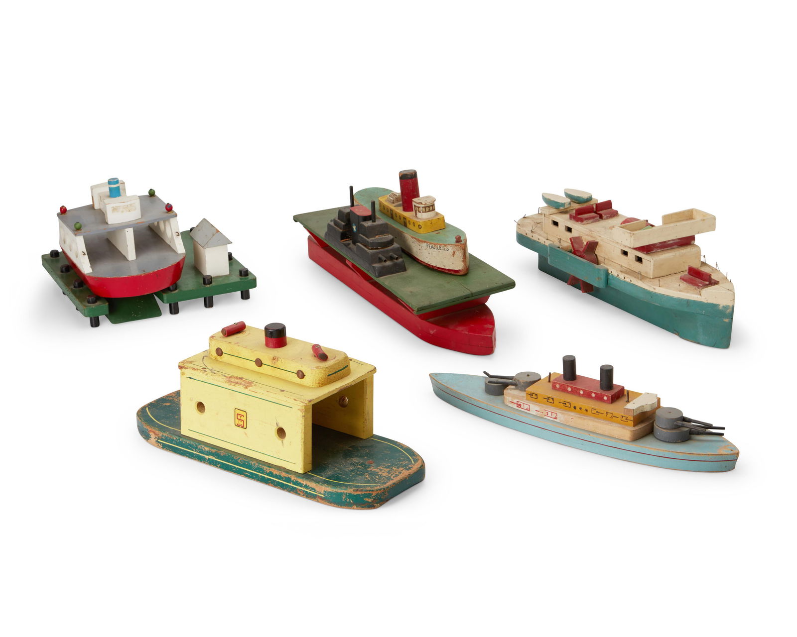 A group of polychrome wood model ships (1 of 2)