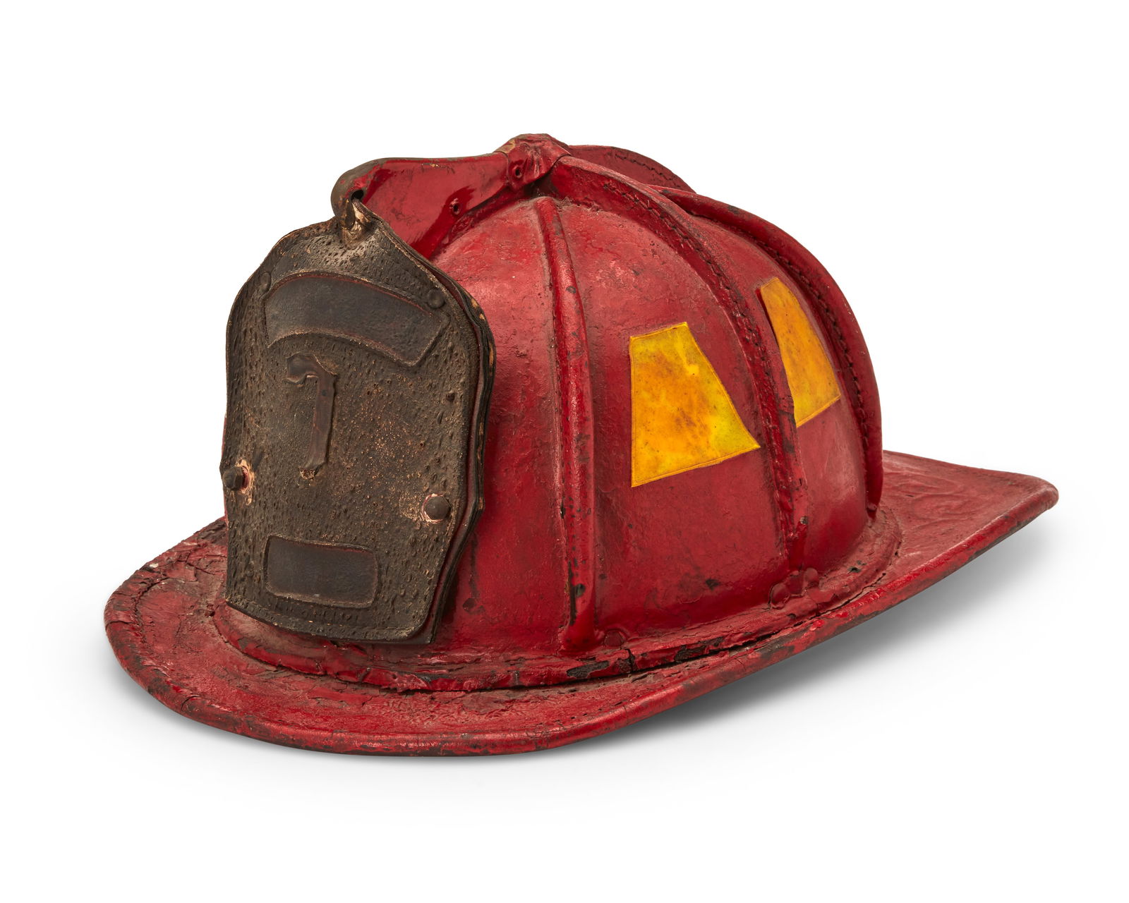 A Cairns & Brothers fireman helmet: A Cairns & Brothers fireman helmetMid-20th centuryBadge reads faintly: SRT CAPT / 7 / MFDThe metal and red leather helmet with front and rear visors, featuring a leather badge, the interior with cotto