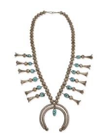 A Southwest silver and turquoise squash blossom necklace
