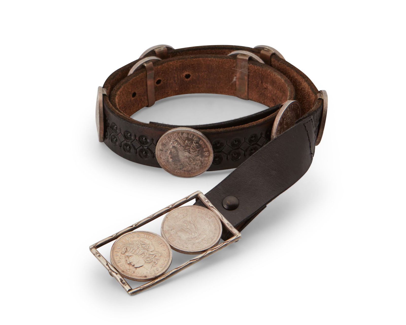 A Western-style silver coin concho belt (1 of 6)