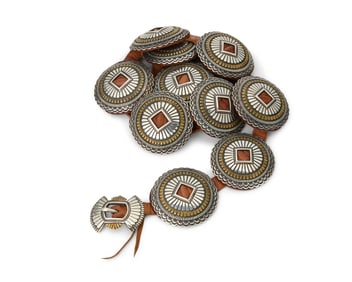 A Walt Doran First Phase-style sterling silver and brass concho belt