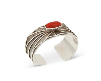A Southwest sterling silver and coral cuff bracelet