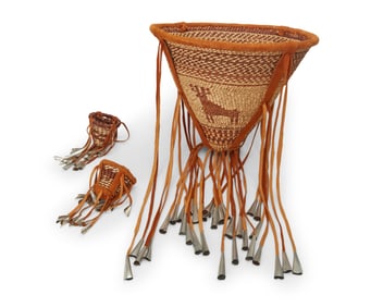 Three Apache burden baskets