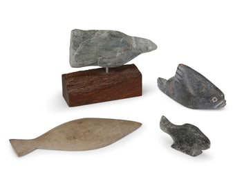 A group of Inuit carved stone animal figures