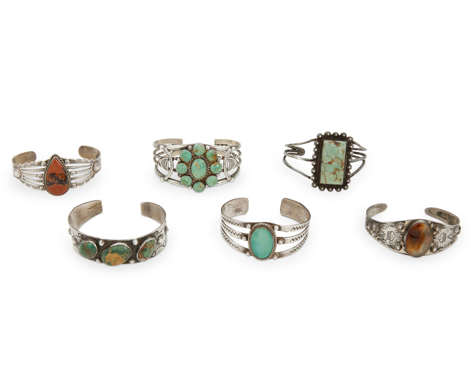 A group of Fred Harvey-style Southwest silver cuff bracelets (1 of 2)