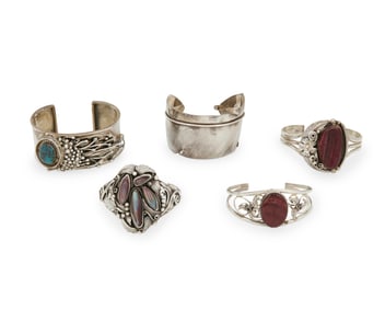 A group of Southwest-style silver cuff bracelets