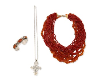 A group of silver and stone jewelry