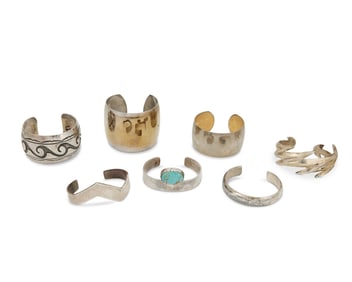 A group of Southwest-style silver cuff bracelets
