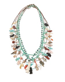 A group of Southwest carved stone fetish and turquoise necklaces