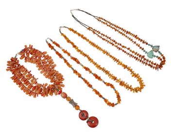 A group of Southwest-style amber and stone bead necklaces