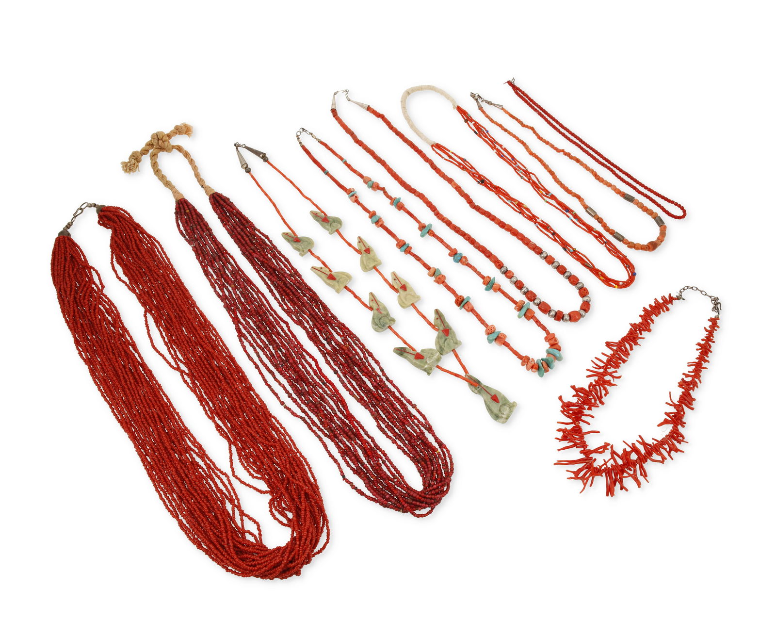 A group of Southwest coral, red glass, and carved stone necklaces (1 of 2)