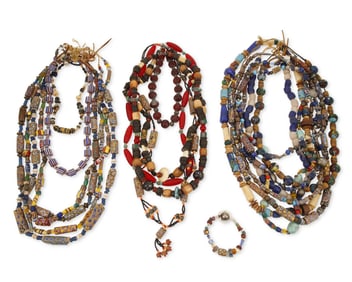 A large group of trade beads and necklaces