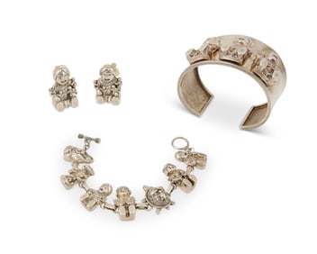 A group of Carol Felley sterling silver storyteller jewelry