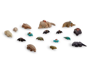 A group of Zuni carved stone mole fetish figures