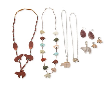 A group of Southwest silver and carved stone bear fetish jewelry