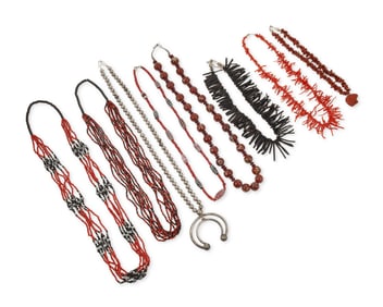 A group of Southwest silver, black, and red jewelry